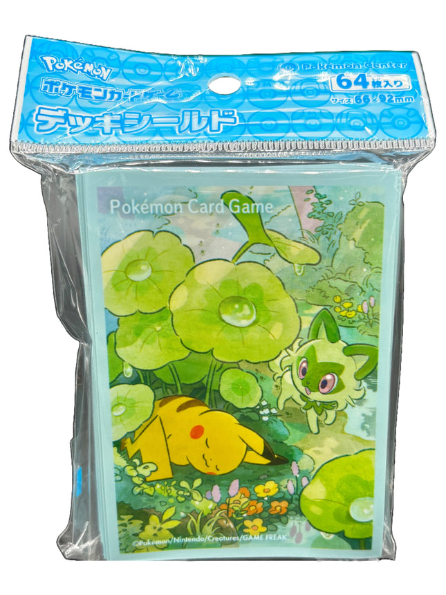 Pokémon Center Japan card sleeves featuring Pikachu and Sprigatito.