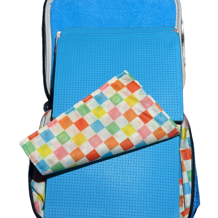 Blue bag with a colorful checkered pouch on a white background